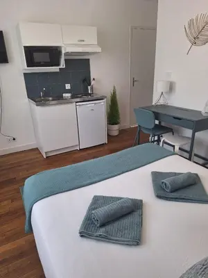 Cuisine ou kitchenette dans l'établissement L'Appel De La Forêt - Wifi Fibre, Linge & Parking