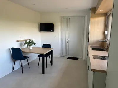 Télévision ou salle de divertissement dans l'établissement Studio