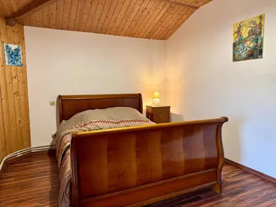 Un ou plusieurs lits dans un hébergement de l'établissement Grande Maison au Calme
