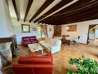 Coin salon dans l'établissement Grande Maison au Calme