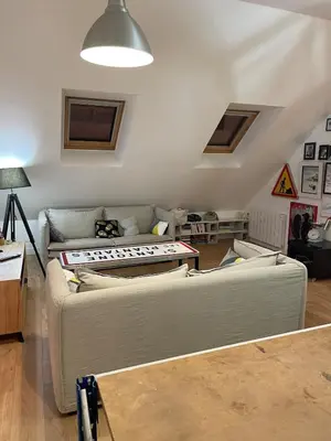 Coin salon dans l'établissement appartement complet