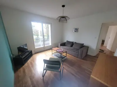 Télévision ou salle de divertissement dans l'établissement Appartement bord de mer, T4