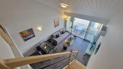 Coin salon dans l'établissement Appartement T2 avec Balcon, Parking Privée à 2min de la plage, Rue Piétonne