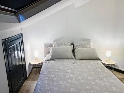 Un ou plusieurs lits dans un hébergement de l'établissement Charmant T2 au coeur d'Angers
