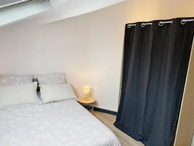 Un ou plusieurs lits dans un hébergement de l'établissement Charmant T2 au coeur d'Angers