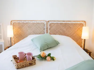 Un ou plusieurs lits dans un hébergement de l'établissement Apartment Atlantica-3 by Interhome