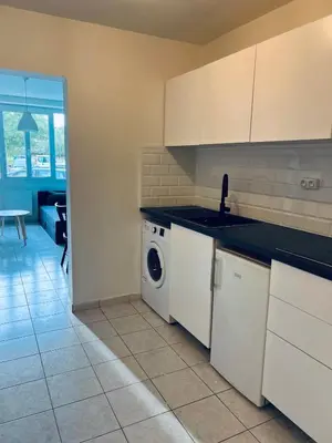 Cuisine ou kitchenette dans l'établissement Appartements à Saint Nazaire, parking gratuit
