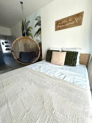 Un ou plusieurs lits dans un hébergement de l'établissement Rêve Tropical, Proche plage, place de parking