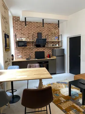 Cuisine ou kitchenette dans l'établissement id-home Tour de Bretagne