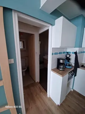 Cuisine ou kitchenette dans l'établissement Le Mathgo