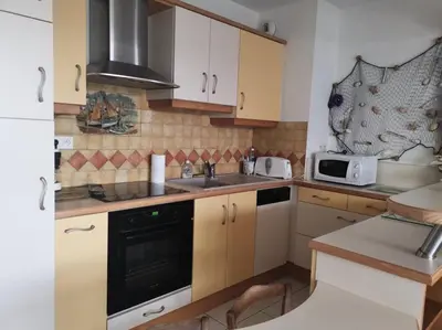 Cuisine ou kitchenette dans l'établissement Résidence Le Galatée - Location de Vacances - PORNICHET - proche place du marché MAE-7421