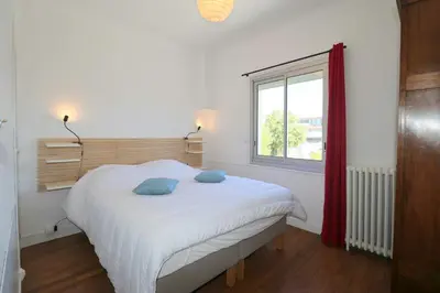 Un ou plusieurs lits dans un hébergement de l'établissement L'Escale by Tranquil at Home