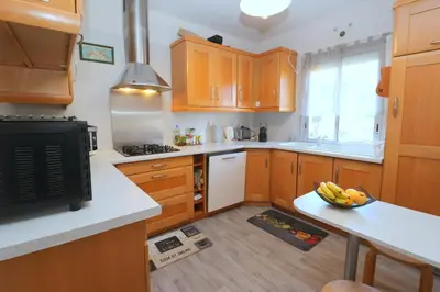 Cuisine ou kitchenette dans l'établissement L'Escale by Tranquil at Home