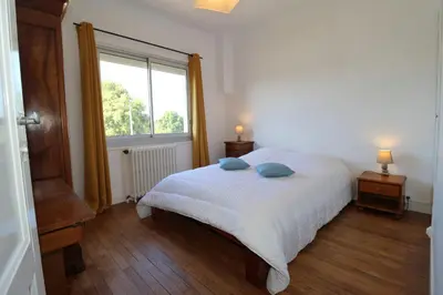 Un ou plusieurs lits dans un hébergement de l'établissement L'Escale by Tranquil at Home