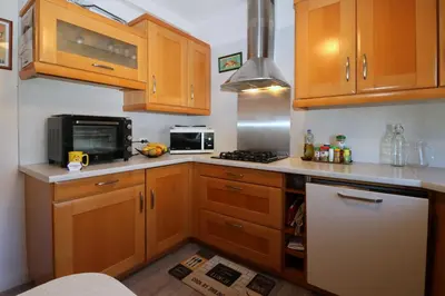 Cuisine ou kitchenette dans l'établissement L'Escale by Tranquil at Home