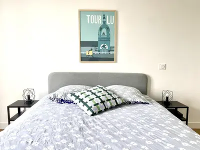 Un ou plusieurs lits dans un hébergement de l'établissement NaonedLoft au Coeur de la Ville