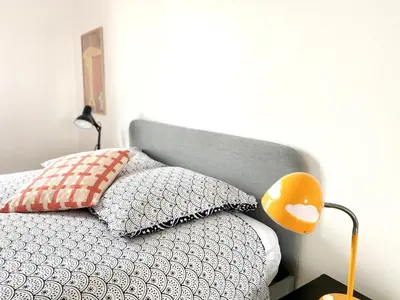 Un ou plusieurs lits dans un hébergement de l'établissement NaonedLoft au Coeur de la Ville