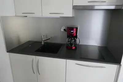 Cuisine ou kitchenette dans l'établissement Le Green Set