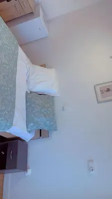 Un ou plusieurs lits dans un hébergement de l'établissement Manuela Home