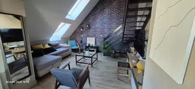 Télévision ou salle de divertissement dans l'établissement Relaxant chambre à Île de Nantes