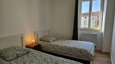 Un ou plusieurs lits dans un hébergement de l'établissement Le gîte de Billie Centre le Fuilet