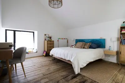 Un ou plusieurs lits dans un hébergement de l'établissement Le Loft Nantais - Superbe Loft de 300m²