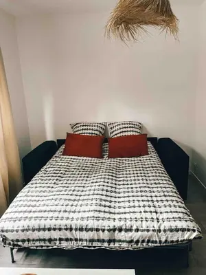 Un ou plusieurs lits dans un hébergement de l'établissement Studio cosy Ile de Nantes proche tram ligne 2 et 3