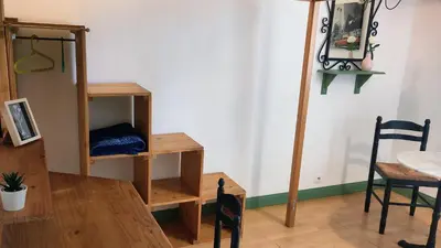 Télévision ou salle de divertissement dans l'établissement Chambre - Studette Indépendante Zola
