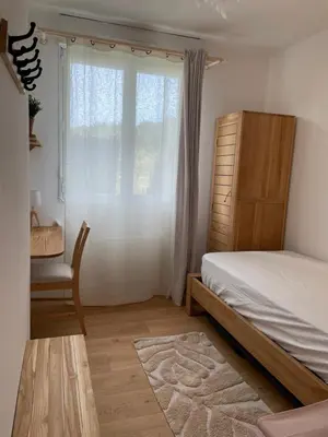 Un ou plusieurs lits dans un hébergement de l'établissement Logis Cosy plage à pied