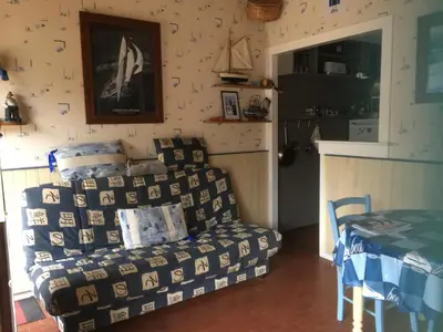 Coin salon dans l'établissement maison latéral mer