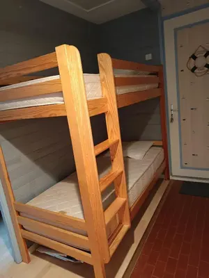 Un ou plusieurs lits dans un hébergement de l'établissement maison latéral mer