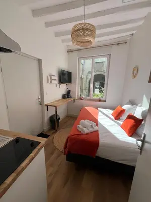 Un ou plusieurs lits dans un hébergement de l'établissement STUDIO CENTRE VILLE ANGERS RDC - 2 personnes