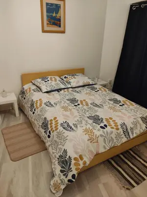 Un ou plusieurs lits dans un hébergement de l'établissement Appartement des machines