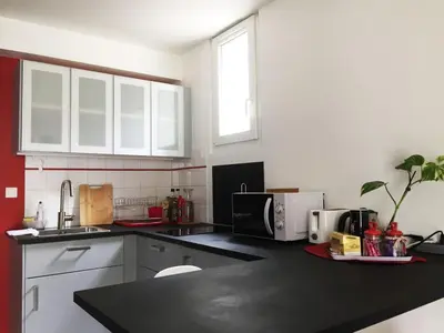 Cuisine ou kitchenette dans l'établissement Le Léon Blum - T2 Cosy and soothing