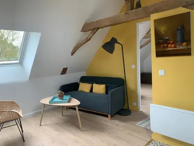 Coin salon dans l'établissement Gîte de la Bourrelière, Meublé de tourisme 3 étoiles