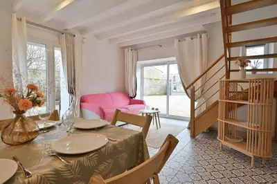 Coin salon dans l'établissement Au petit jardin d Aizenay