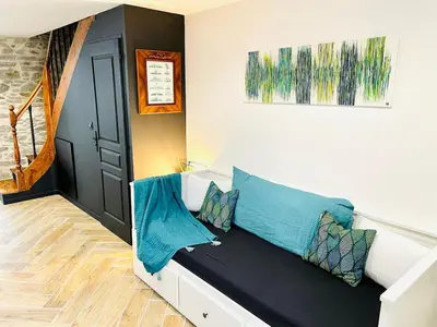 Coin salon dans l'établissement Maison plage centre ville typique