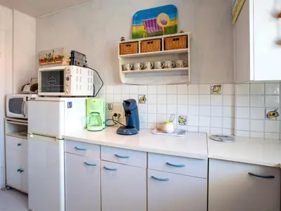 Cuisine ou kitchenette dans l'établissement Apartment Les Tilleuls-3 by Interhome