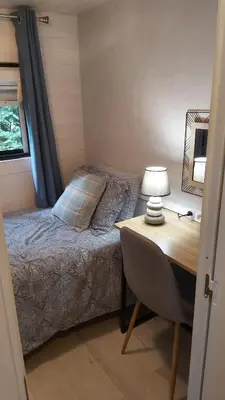 Un ou plusieurs lits dans un hébergement de l'établissement Cabane du lac