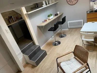 Coin salon dans l'établissement Joli logement très accueillant