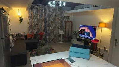 Télévision ou salle de divertissement dans l'établissement Cosy loft au coeur de Nantes centre ville