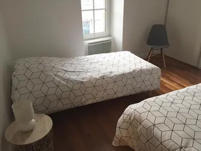 Un ou plusieurs lits dans un hébergement de l'établissement Maison Cosy centre de Pouzauges