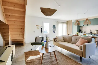 Coin salon dans l'établissement Belle maison pour 8 - 300m de la plage - Terrasse