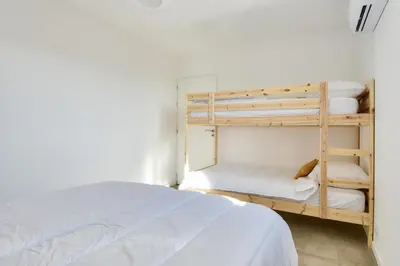 Un ou plusieurs lits dans un hébergement de l'établissement Belle maison pour 8 - 300m de la plage - Terrasse