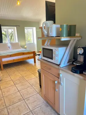 Cuisine ou kitchenette dans l'établissement Le Cocon - Domaine de la Houblette