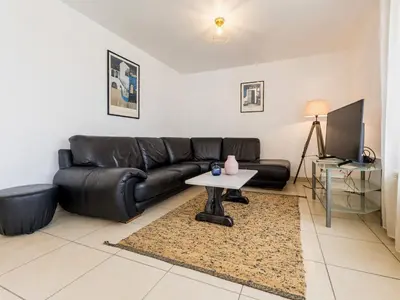 Coin salon dans l'établissement Gîte calme en campagne avec animaux acceptés, parking et wifi - FR-1-306-1302