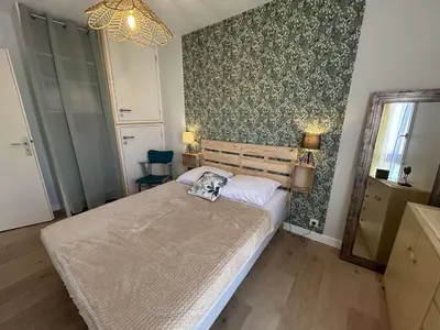 Un ou plusieurs lits dans un hébergement de l'établissement Appartement lumineux 4 couchages, balcon, parking - Saint-Jean-de-Monts - FR-1-224C-344