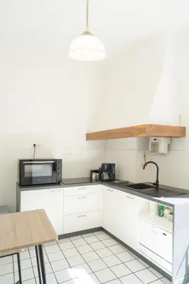Cuisine ou kitchenette dans l'établissement Chaperonnière