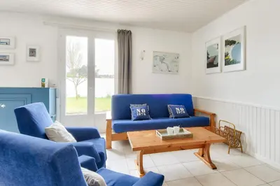 Coin salon dans l'établissement Maison pour 10 avec jardin à Noirmoutier