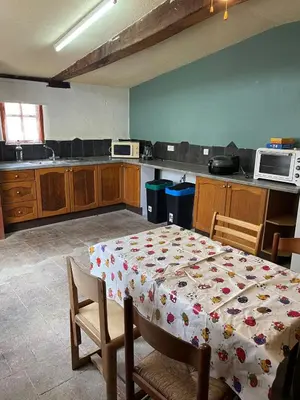 Cuisine ou kitchenette dans l'établissement Grange